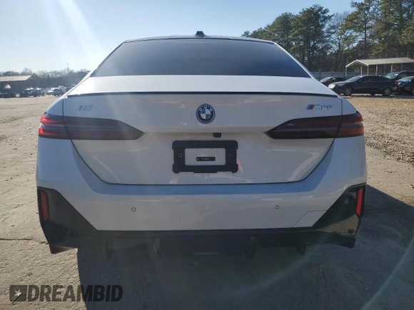 2024 BMW i5 M60 with VIN WBY43FK00RCP86174, listed as a Copart auction lot 45522685 with 7,392 mi miles and Salvage title. Bid and sale history available at DreamBid. Image 6.