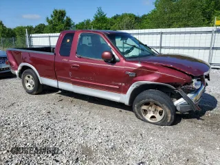 1999 Ford F-150 z VIN 1FTRX17W4XKB49075, wystawiony jako Copart lot #55340865 z przebiegiem Nie podano mil oraz Szkoda całkowita • Salvage title. Historia ofert i sprzedaży dostępna na DreamBid. Obrazek 4.