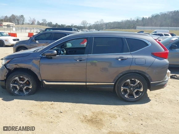 2019 Honda CR-V Touring with VIN 7FARW1H98KE007592, listed as a IAAI auction lot 41711030 with 58,118 mi miles. Bid and sale history available at carsss.com. Image 14.