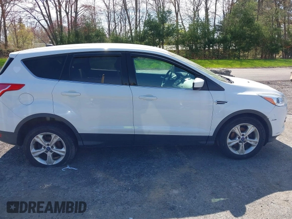 2013 Ford Escape SE with VIN 1FMCU0GXXDUA73875, listed as a IAAI auction lot 42164115 with 195,712 mi miles and . Bid and sale history available at carsss.com. Image 13.