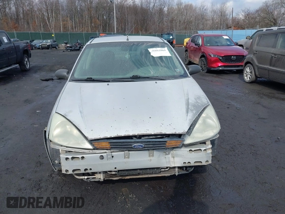 2001 Ford Focus LX with VIN 1FAFP33P31W297608, listed as a IAAI auction lot 41663965 with 142,898 mi miles and . Bid and sale history available at carsss.com. Image 12.