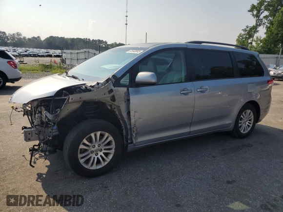 2013 Toyota Sienna XLE AAS with VIN 5TDYK3DC0DS357281, listed as a Copart auction lot 61640645 with 69,262 mi miles and Salvage title. Bid and sale history available at DreamBid. Image 1.
