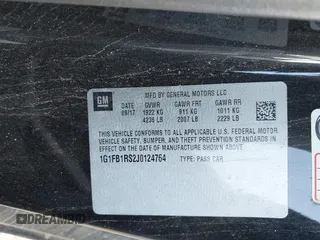 2018 Chevrolet Camaro 1LT z VIN 1G1FB1RS2J0124764, wystawiony jako IAAI lot #41428337 z przebiegiem 80 754 mil mil oraz . Historia ofert i sprzedaży dostępna na DreamBid. Obrazek 9.