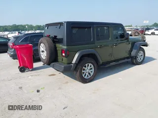 2023 Jeep Wrangler Willys with VIN 1C4HJXDG7PW646627, listed as a IAAI auction lot 42469601 with 50,178 mi miles and . Bid and sale history available at DreamBid. Image 4.