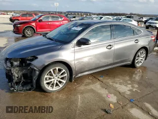2014 Toyota Avalon Limited with VIN 4T1BK1EB8EU128758, listed as a Copart auction lot 43704415 with 88,504 mi miles and Clean Title. Bid and sale history available at carsss.com. Image 1.