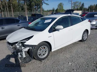2020 Toyota Prius L Eco with VIN JTDKARFU5L3124692, listed as a IAAI auction lot 42019339 with 178,081 mi miles. Bid and sale history available at carsss.com. Image 2.