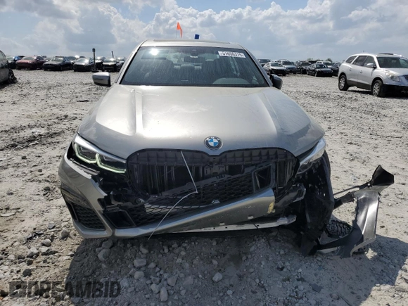2022 BMW 7 Series 740i with VIN WBA7T2C09NCJ48292, listed as a Copart auction lot 51650315 with 21,585 mi miles and Salvage Title. Bid and sale history available at carsss.com. Image 5.