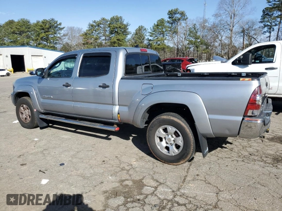 2015 Toyota Tacoma with VIN 3TMMU4FN7FM086266, listed as a Copart auction lot 47877855 with 107,381 mi miles and Clean title. Bid and sale history available at DreamBid. Image 2.
