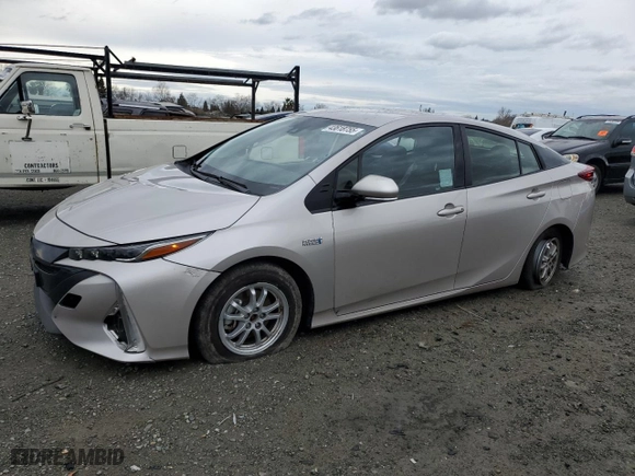 2021 Toyota Prius Prime LE with VIN JTDKAMFP7M3175920, listed as a Copart auction lot 43618755 with 105,228 mi miles and Salvage Title. Bid and sale history available at carsss.com. Image 1.