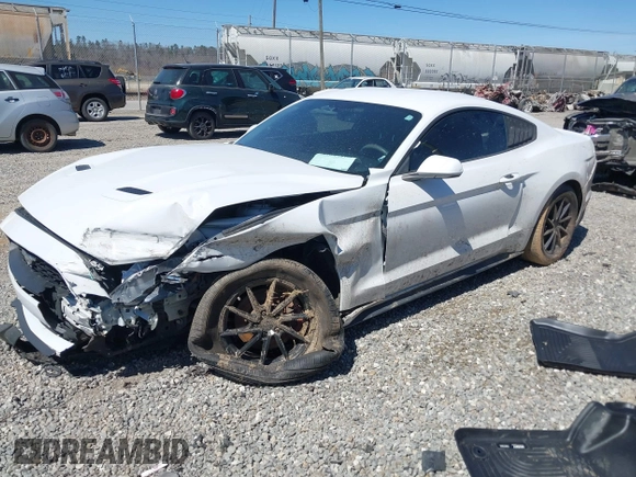 2018 Ford Mustang EcoBoost z VIN 1FA6P8TH9J5101182, wystawiony jako IAAI lot #41847168 z przebiegiem 98 168 mil mil oraz . Historia ofert i sprzedaży dostępna na DreamBid. Obrazek 18.