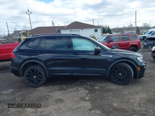 2021 Volkswagen Tiguan SE with VIN 3VV2B7AX1MM101432, listed as a IAAI auction lot 41982286 with 72,252 mi miles and . Bid and sale history available at DreamBid. Image 13.