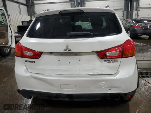 2014 Mitsubishi Outlander SE z VIN 4A4AR4AU6EE026656, wystawiony jako Copart lot #52806745 z przebiegiem 177 933 mil mil oraz Szkoda całkowita • Salvage title. Historia ofert i sprzedaży dostępna na DreamBid. Obrazek 6.