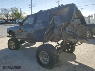 2000 Jeep Cherokee Police with VIN 1J4FF48S1YL246243, listed as a Copart auction lot 84954674 with 0 mi miles and Salvage Title. Bid and sale history available at carsss.com. Image 2.