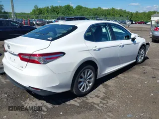 2019 Toyota Camry LE with VIN 4T1B11HK2KU187475, listed as a IAAI auction lot 42192293 with 44,413 mi miles and . Bid and sale history available at DreamBid. Image 4.