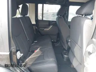 2013 Jeep Wrangler Unlimited Freedom z VIN 1C4BJWDG8DL648870, wystawiony jako IAAI lot #41909372 z przebiegiem 184 203 mil mil oraz . Historia ofert i sprzedaży dostępna na DreamBid. Obrazek 8.