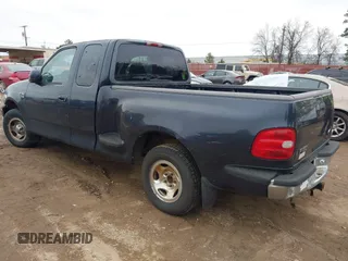 1999 Ford F-150 with VIN 1FTRX07W3XKC24438, listed as a IAAI auction lot 41634802 with Not provided miles and . Bid and sale history available at DreamBid. Image 3.