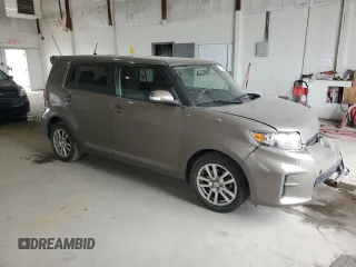 2012 Scion xB z VIN JTLZE4FE6C1145727, wystawiony jako Copart lot #54135915 z przebiegiem 111 652 mil mil oraz Szkody całkowita. Historia ofert i sprzedaży dostępna na DreamBid. Obrazek 4.