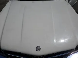 1984 Mercedes-Benz 500 z VIN WDBCA44A1EA029351, wystawiony jako Copart lot #59357115 z przebiegiem 155 975 mil mil oraz Tytuł czysty. Historia ofert i sprzedaży dostępna na DreamBid. Obrazek 11.