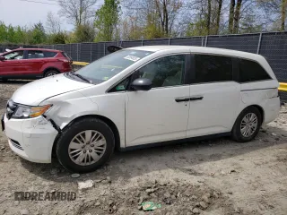 2014 Honda Odyssey LX with VIN 5FNRL5H27EB116435, listed as a Copart auction lot 52864825 with 94,643 mi miles and Salvage Title. Bid and sale history available at carsss.com. Image 1.