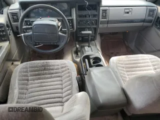1994 Jeep Grand Cherokee Laredo с VIN 1J4GZ58S7RC311048, выставлен на аукционе Copart как лот 56759635 с пробегом 242 460 миль миль и Списание • Salvage title. История ставок и продаж доступна на DreamBid. Изображение 8.