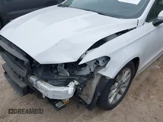 2017 Ford Fusion SE z VIN 3FA6P0H71HR413635, wystawiony jako IAAI lot #42507386 z przebiegiem 165 991 mil mil oraz . Historia ofert i sprzedaży dostępna na DreamBid. Obrazek 20.