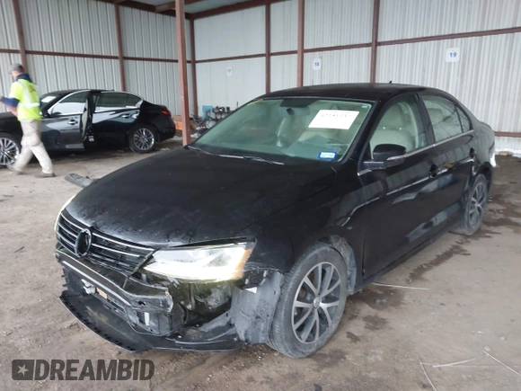 2018 Volkswagen Jetta SE with VIN 3VWDB7AJ3JM214858, listed as a IAAI auction lot 42151137 with 100,346 mi miles and . Bid and sale history available at DreamBid. Image 2.