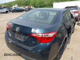 2018 Toyota Corolla L with VIN 2T1BURHE1JC052651, listed as a IAAI auction lot 42430958 with 104,664 mi miles and . Bid and sale history available at DreamBid. Image 4.