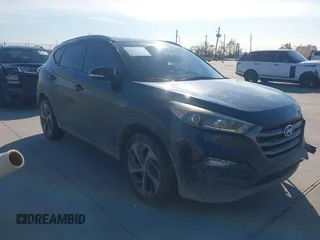 2016 Hyundai Tucson Sport with VIN KM8J33A27GU073622, listed as a IAAI auction lot 41034355 with 125,064 mi miles. Bid and sale history available at carsss.com. Image 1.