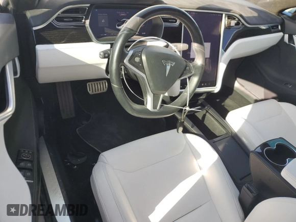 2016 Tesla Model S 90D with VIN 5YJSA1E49GF159988, listed as a Copart auction lot 76457024 with Not Provided miles and Salvage Title. Bid and sale history available at DreamBid. Image 8.