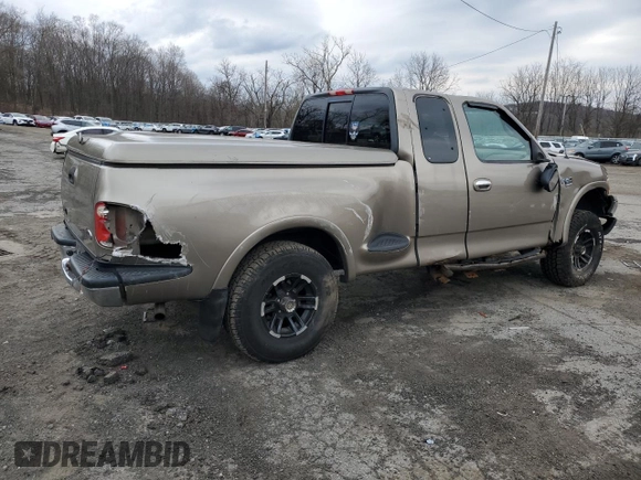 2002 Ford F-150 XL with VIN 1FTRX08L12KA41875, listed as a Copart auction lot 64756525 with 221,793 mi miles and Non repairable. Bid and sale history available at DreamBid. Image 3.