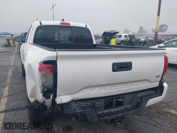 2023 Toyota Tacoma SR z VIN 3TYRZ5CN1PT037202, wystawiony jako IAAI lot #41896502 z przebiegiem 45 568 mil mil oraz . Historia ofert i sprzedaży dostępna na DreamBid. Obrazek 6.