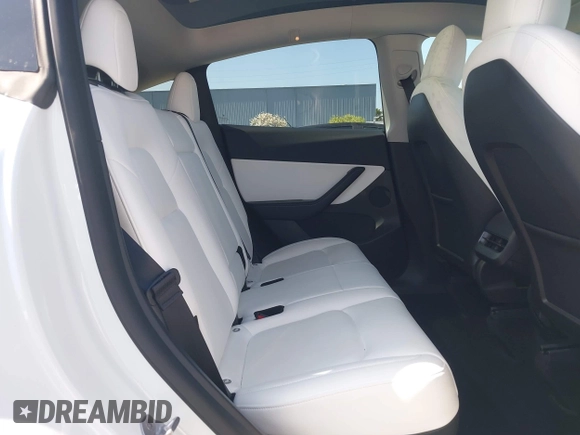 2021 Tesla Model Y Long Range with VIN 5YJYGDEEXMF280480, listed as a IAAI auction lot 41993633 with 69,579 mi miles. Bid and sale history available at carsss.com. Image 8.