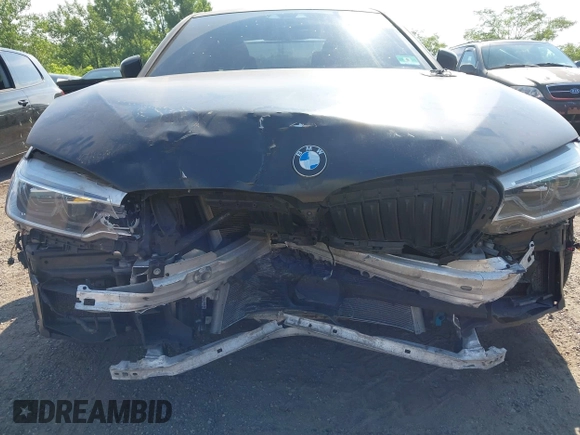 2018 BMW 5 Series M550i xDrive with VIN WBAJB9C55JB286747, listed as a IAAI auction lot 42583106 with 141,102 mi miles and . Bid and sale history available at DreamBid. Image 6.