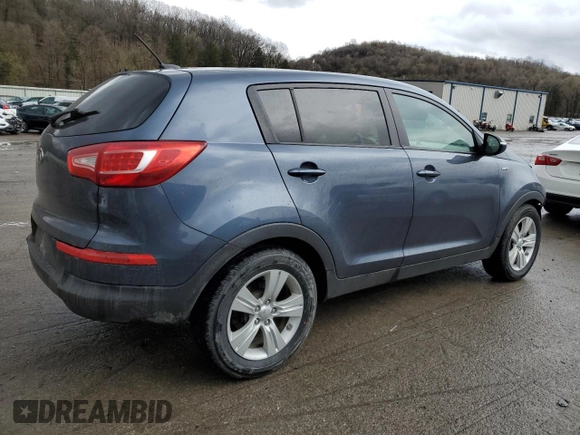 2012 Kia Sportage LX with VIN KNDPBCA25C7285039, listed as a Copart auction lot 52620735 with 197,305 mi miles and Salvage title. Bid and sale history available at DreamBid. Image 3.