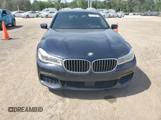 2016 BMW 7 Series 750i z VIN WBA7F0C57GGM20650, wystawiony jako Copart lot #57177555 z przebiegiem 113 632 mil mil oraz Tytuł czysty. Historia ofert i sprzedaży dostępna na DreamBid. Obrazek 5.