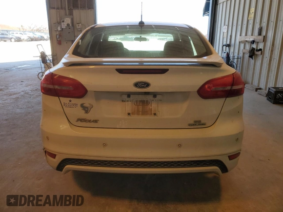 2016 Ford Focus SE with VIN 1FADP3F2XGL253039, listed as a Copart auction lot 45590535 with 104,933 mi miles and Salvage Title. Bid and sale history available at carsss.com. Image 6.