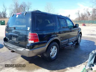 2004 Ford Expedition Special Service with VIN 1FMPU16L44LA17586, listed as a IAAI auction lot 41619534 with 140,299 mi miles. Bid and sale history available at carsss.com. Image 4.