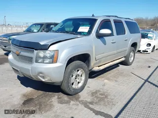 2012 Chevrolet Suburban LT with VIN 1GNSKJE72CR181012, listed as a IAAI auction lot 41621884 with 197,467 mi miles. Bid and sale history available at carsss.com. Image 2.