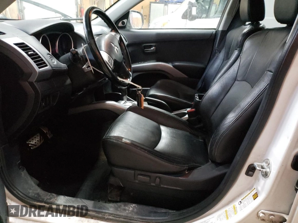 2012 Mitsubishi Outlander GT z VIN JA4JT5AX5CU003648, wystawiony jako Copart lot #48328185 z przebiegiem 223 513 mil mil oraz Czysty tytuł • Clean title. Historia ofert i sprzedaży dostępna na DreamBid. Obrazek 7.
