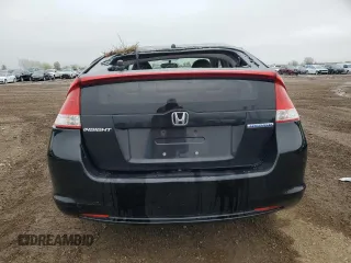 2010 Honda Insight LX with VIN JHMZE2H56AS022299, listed as a Copart auction lot 54872215 with 149,514 mi miles and Salvage title. Bid and sale history available at DreamBid. Image 6.