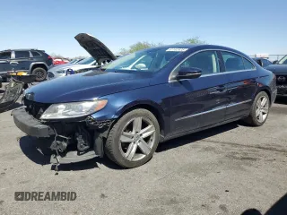 2014 Volkswagen CC Sport with VIN WVWBP7AN6EE529034, listed as a Copart auction lot 61102635 with 138,406 mi miles and Salvage title. Bid and sale history available at DreamBid. Image 1.