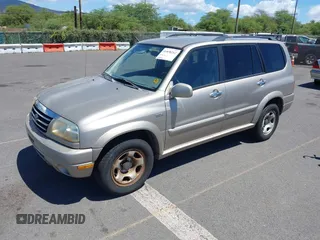 2002 Suzuki XL-7 with VIN JS3TY92V724105263, listed as a IAAI auction lot 41858262 with 103,249 mi miles. Bid and sale history available at carsss.com. Image 2.