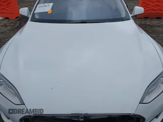 2016 Tesla Model S 70 with VIN 5YJSA1E11GF132984, listed as a IAAI auction lot 42428634 with Not provided miles and . Bid and sale history available at DreamBid. Image 10.