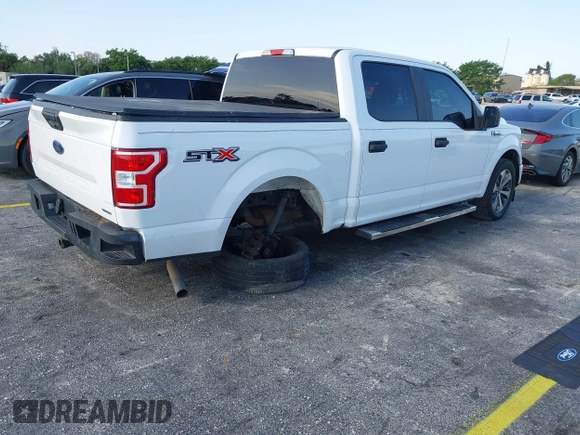 2019 Ford F-150 XL with VIN 1FTEW1CP9KKC27035, listed as a IAAI auction lot 41994993 with 125,879 mi miles and . Bid and sale history available at carsss.com. Image 4.
