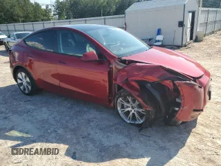 2024 Tesla Model Y Long Range z VIN 7SAYGAEEXRF071829, wystawiony jako Copart lot #56003215 z przebiegiem 29 446 mil mil oraz Szkoda całkowita • Salvage title. Historia ofert i sprzedaży dostępna na DreamBid. Obrazek 4.