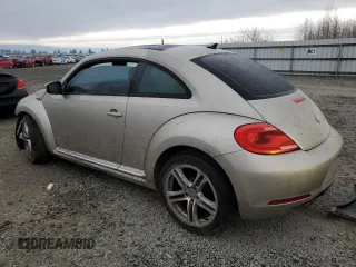 2013 Volkswagen Beetle 2.5L w/Sun with VIN 3VWJP7AT2DM673129, listed as a Copart auction lot 43284955 with 145,864 mi miles and Salvage title. Bid and sale history available at DreamBid. Image 2.