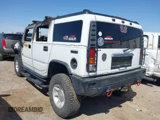 2003 Hummer H2 z VIN 5GRGN23U13H132778, wystawiony jako IAAI lot #41985070 z przebiegiem Nie podano mil oraz . Historia ofert i sprzedaży dostępna na DreamBid. Obrazek 3.