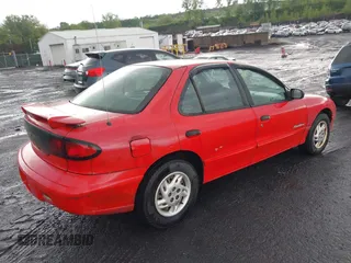 1999 Pontiac Sunfire SE z VIN 1G2JB5248X7528290, wystawiony jako IAAI lot #42252324 z przebiegiem 156 758 mil mil oraz . Historia ofert i sprzedaży dostępna na DreamBid. Obrazek 4.