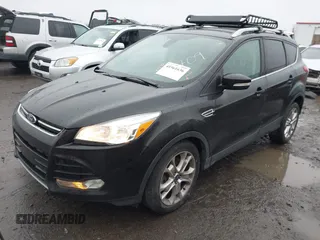 2015 Ford Escape Titanium with VIN 1FMCU0J97FUB45709, listed as a IAAI auction lot 41561636 with 88,296 mi miles. Bid and sale history available at carsss.com. Image 17.