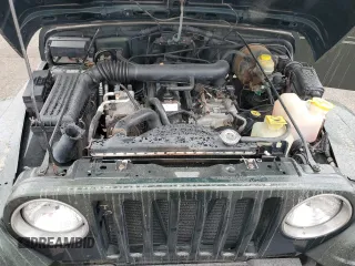 1998 Jeep Wrangler Sahara with VIN 1J4FY49S2WP707318, listed as a Copart auction lot 59508635 with 144,948 mi miles and Clean title. Bid and sale history available at DreamBid. Image 12.